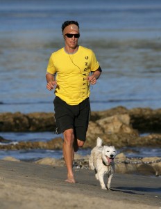 01-31-09  Malibu, CA Actor Matthew McConaughey takes a jog on the beach with his dog BJ in Malibu, CA.  Also check out Matt's J.K. Livin' headband- that's his own clothing line! Non-Exclusive PIX by Belle Pictures/Flynet ©2008 323-833-7042  Nicolas