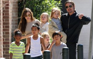 #7006830 The Jolie-Pitt family headed out in New Orleans, Louisiana to do some grocery shopping at a local market on March 20, 2011. Angelina has brought all six children to visit their dad Brad Pitt while he works on his latest project "Cogan's Trade". Maddox, Pax, Zahara and Shiloh walked while the twins Knox and Vivienne hitched a ride from mom and dad who were all smiles while out and about on a lovely sunny day. Brad and Angelina waved to fans as they strolled the street to and from the market.  Fame Pictures, Inc - Santa Monica, CA, USA - +1 (310) 395-0500