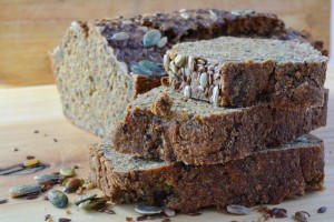 Chrono, organic, unleavened bread with various seeds, pumpkin, sunflower, flax seeds, delicious and very healthy, side view, close up