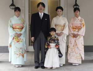 FILE - In this Nov. 3, 2011, file photo, Japan's Prince Hisahito, wearing a traditional ceremonial attire, is accompanied by his parents, Prince Akishino, Princess Kiko, his sisters Princess Mako, left, and Princess Kako, right, after attending "Chakko-no-gi" ceremony to celebrate his growth and the passage from infancy to childhood, at the Akasaka imperial estate in Tokyo. Princess Mako, the granddaughter of Emperor Akihito, is getting married to an ocean lover who can ski, play the violin and cook, according to public broadcaster NHK TV. The Imperial Household Agency declined to confirm the report Tuesday, May 16, 2017. (AP Photo/Issei Kato, Pool, File)