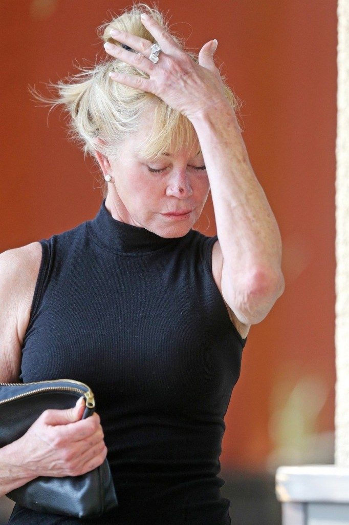 West Hollywood, CA  - *EXCLUSIVE* Melanie Griffith gets camera shy as she steps out for groceries at Bristol Farms with messy hair and no make up revealing a scab on her nose. Pictured: Melanie Griffith BACKGRID USA 8 SEPTEMBER 2017, Image: 348810188, License: Rights-managed, Restrictions: , Model Release: no, Credit line: Profimedia, AKM-GSI